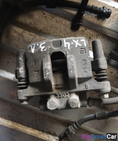 Суппорт задний левый митсубиси Лансер 10 - купить Екатеринбурге